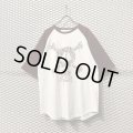 STUSSY - "Bandage Skull" Raglan Tee