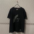 VICTIM - John Lennon Tee