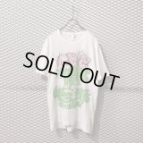 COMME des GARCONS SHIRT - "KAWS" Logo Tee